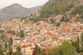 Beautiful Scenic View of Taormina`s Old Town. Terracotta Old Ancient City Houses with Tiled Roofs. The island of Sicily, Italy Royalty Free Stock Photo