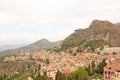 Beautiful Scenic View of Taormina`s Old Town. Terracotta Old Ancient City Houses with Tiled Roofs. The island of Sicily, Italy Royalty Free Stock Photo