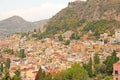 Beautiful Scenic View of Taormina`s Old Town. Terracotta Old Ancient City Houses with Tiled Roofs. The island of Sicily, Italy Royalty Free Stock Photo