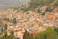 Beautiful Scenic View of Taormina`s Old Town. Terracotta Old Ancient City Houses with Tiled Roofs. The island of Sicily, Italy Royalty Free Stock Photo