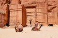 Two Camels In Front of Ancient Nabataean Ruined Rock-Cut Tomb in Petra, Jordan