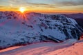 Beautiful scenic winter mountain sunset landscape of snowy Caucasus Mountains and ski slope of Gorki Gorod mountain ski resort in Royalty Free Stock Photo