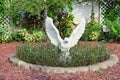 A beautiful school garden and a white statue of eagle