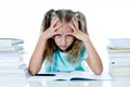 Beautiful school girl having too many homework and it is driving her crazy in motivation low performance children Royalty Free Stock Photo