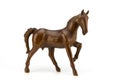 Beautiful sculpture of horse made of wood isolated on the white