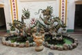 Beautiful sculptures of mythological dragons at an old heritage temple in the town of Hoi An