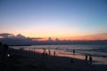 Beautiful sea beach sunrise sunset colorful sky view people walking Royalty Free Stock Photo