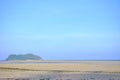 A beautiful sea beach with water waves and a horizontal line,blue sky in bright day Royalty Free Stock Photo