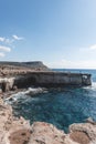 Beautiful sea caves with cape Greco on background in national park Royalty Free Stock Photo