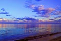 Beautiful sea landcsape.Fluffy clouds on th sky.Colorful sunset.Clouds reflection in the water Royalty Free Stock Photo