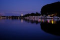 Beautiful sea, river landscape with boats and yachts on the Wiesbaden pier in Germany, evening lights and reflections in the water Royalty Free Stock Photo