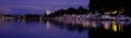 Beautiful sea, river landscape with boats and yachts on the Wiesbaden pier in Germany, evening lights and reflections in the water Royalty Free Stock Photo