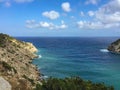 Beautiful sea and rocks vew over horizon in Cala Llonga bay, Me Royalty Free Stock Photo