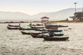 Beautiful sea, sand and fishing boats with mountain and blue sky Royalty Free Stock Photo