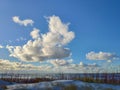 Beautiful sea scape with sand dunes and cloudy blue sky Royalty Free Stock Photo