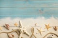 Beautiful sea stars, shells, rope and sand on blue wooden background, flat lay. Space for text Royalty Free Stock Photo
