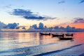 Beautiful sea sunset, ocean sunrise, tropical island beach landscape, blue water waves, fisherman boat, ship silhouette, colorful Royalty Free Stock Photo
