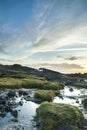 Beautiful sea swamp and mountains landscape at sunset Royalty Free Stock Photo