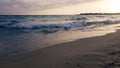 Beautiful sea with turquoise water and golden beach at the sunset in Alimini, Salento,Puglia, Italy Royalty Free Stock Photo