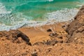 Beautiful sea with turquoise water and rocks on the shore in Fuerteventura