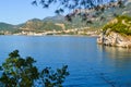 Beautiful sea view. The mountains descend into the sea. Blue sky and turquoise water. Adriatic Sea. Montenegro. Royalty Free Stock Photo