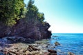 Beautiful sea view. The mountains descend into the sea. Blue sky with clouds and turquoise water. Adriatic Sea. Montenegro. Royalty Free Stock Photo