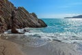 Beautiful sea view. The mountains descend into the sea. Blue sky with clouds and turquoise water. Adriatic Sea. Montenegro. Royalty Free Stock Photo