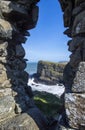 Beautiful sea view from a rock window at Northern Ireland coastline Royalty Free Stock Photo