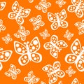 Beautiful seamless butterflies pattern in orange and white colors.