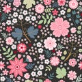 Beautiful seamless ditsy pattern with pink flowers on black background. Fashion design Royalty Free Stock Photo