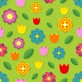 Beautiful seamless pattern of colorful flowers - tulips, chamomile, daisy and leaves.