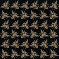 Beautiful seamless pattern of flying bees shiny gold and black print with precious rhinestones, embroidery and jewelry.