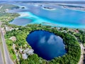 Aerial drone view of Bacalar in Mexico and blue cenote