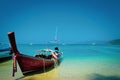 Beautiful seascape of the beach in Thailand and Thai traditional boats at the coast. Royalty Free Stock Photo