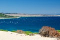 Beautiful seascape with blue sky and Atlantic ocean. A lots of windsurfers and kitesurfers training. Punta Paloma beach, Tarifa Royalty Free Stock Photo