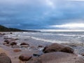 Beautiful seascape, dark clouds and white waves