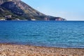 Beautiful seascape. Mountains, pebble beach, sea