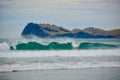 Seashores of New Zealand; beautiful seascape, bright blue ocean, and a small island far away