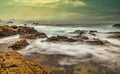 Beautiful seascape, ocean views, rocky coast, sunlight on the horizon. Composition of nature. Sunset scenery background. Cloudy Royalty Free Stock Photo
