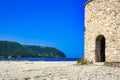 Beautiful seascape with old windmill