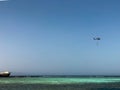 A beautiful seascape overlooking the blue salt sea on the tropical seaside resort and the wreck site of a ship, a boat, a tanker a Royalty Free Stock Photo