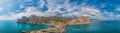 Beautiful seascape, panorama of cape Kapchik to the Galitsin Trail and blue bay of the Black Sea. Sudak, New World. Landscape of