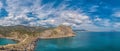 Beautiful seascape, panorama of cape Kapchik to the Galitsin Trail and blue bay of the Black Sea. Sudak, New World. Landscape of