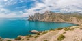 Beautiful seascape, panorama of cape Kapchik to the Galitsin Trail and blue bay of the Black Sea. Sudak, New World. Landscape of