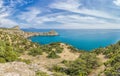 Beautiful seascape, panorama of cape Kapchik to the Galitsin Trail and blue bay of the Black Sea. Sudak, New World. Landscape of Royalty Free Stock Photo