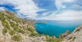 Beautiful seascape, panorama of cape Kapchik to the Galitsin Trail and blue bay of the Black Sea. Sudak, New World. Landscape of