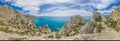 Beautiful seascape, panorama of cape Kapchik to the Galitsin Trail and blue bay of the Black Sea. Sudak, New World. Landscape of