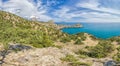 Beautiful seascape, panorama of cape Kapchik to the Galitsin Trail and blue bay of the Black Sea. Sudak, New World. Landscape of