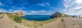 Beautiful seascape, panorama of cape Kapchik to the Galitsin Trail and blue bay of the Black Sea. Sudak, New World. Landscape of