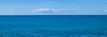 Beautiful Seascape Panorama. Composition of Nature. Paradise Beach. Exotic Water Landscape with Clouds on the Horizon.